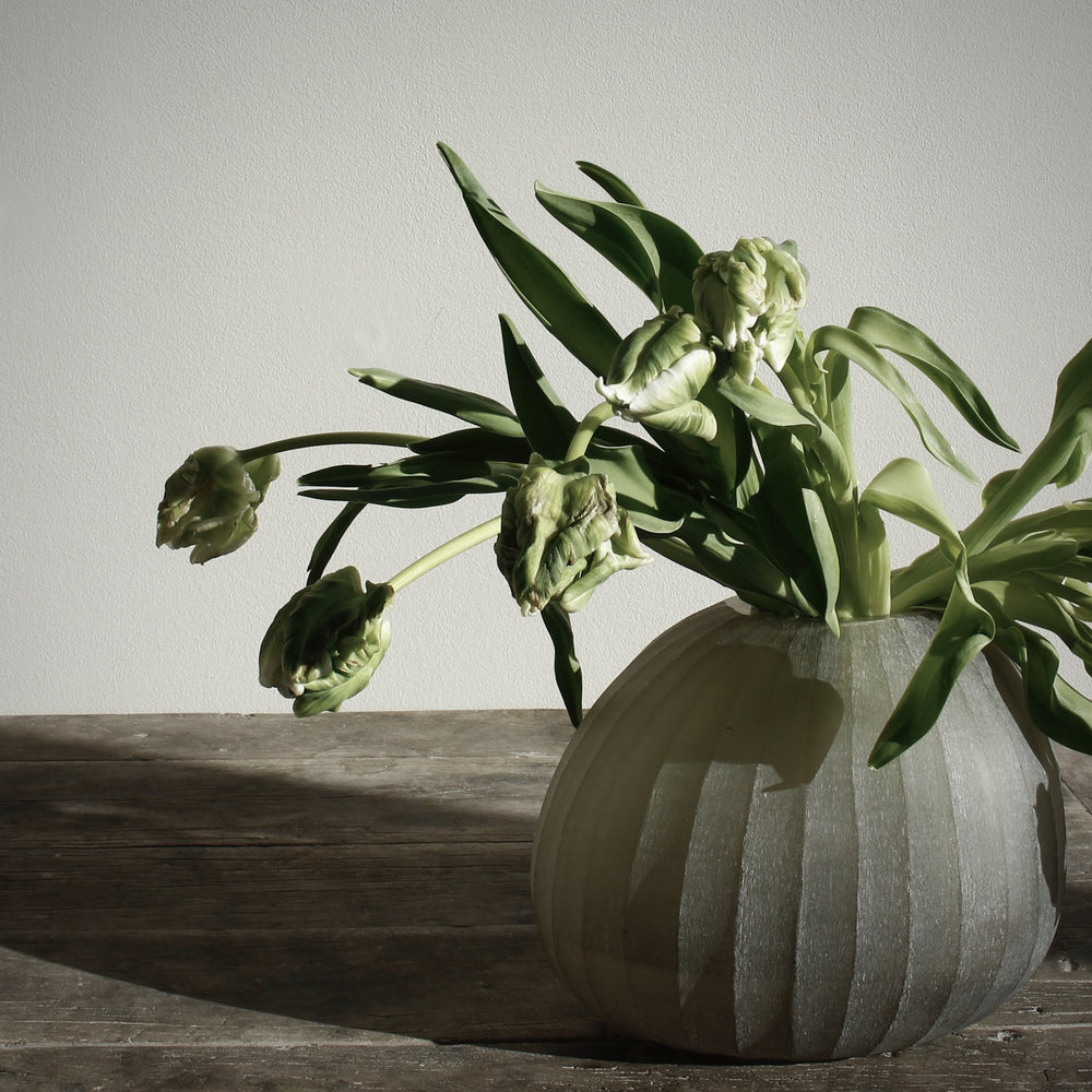 
                  
                    organic vase, sand
                  
                